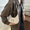 Bow Korean version gentle shoulder bag women 2025 niche new versatile ins underarm dumpling bag foreign style