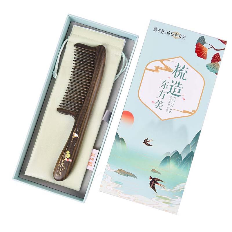 

Tan Mujiang Inlaid Wood Comb