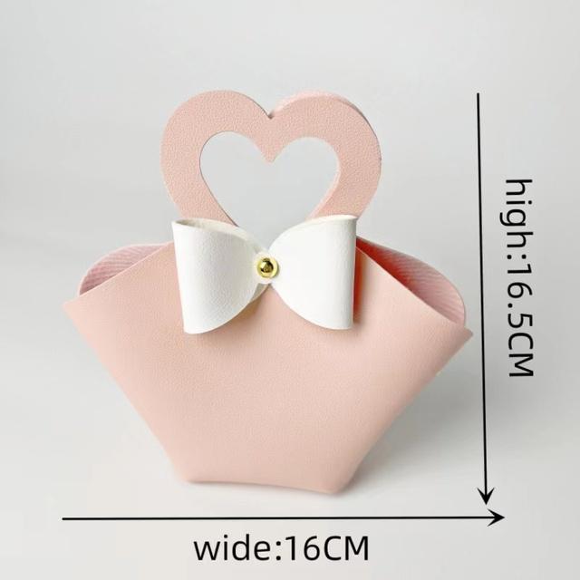 10 pezzi distribuiscono sacchetti regalo in pelle rosa, bomboniere per ospiti, mini borsetta con nastro, scatola per imballaggio di caramelle, decorazioni per feste