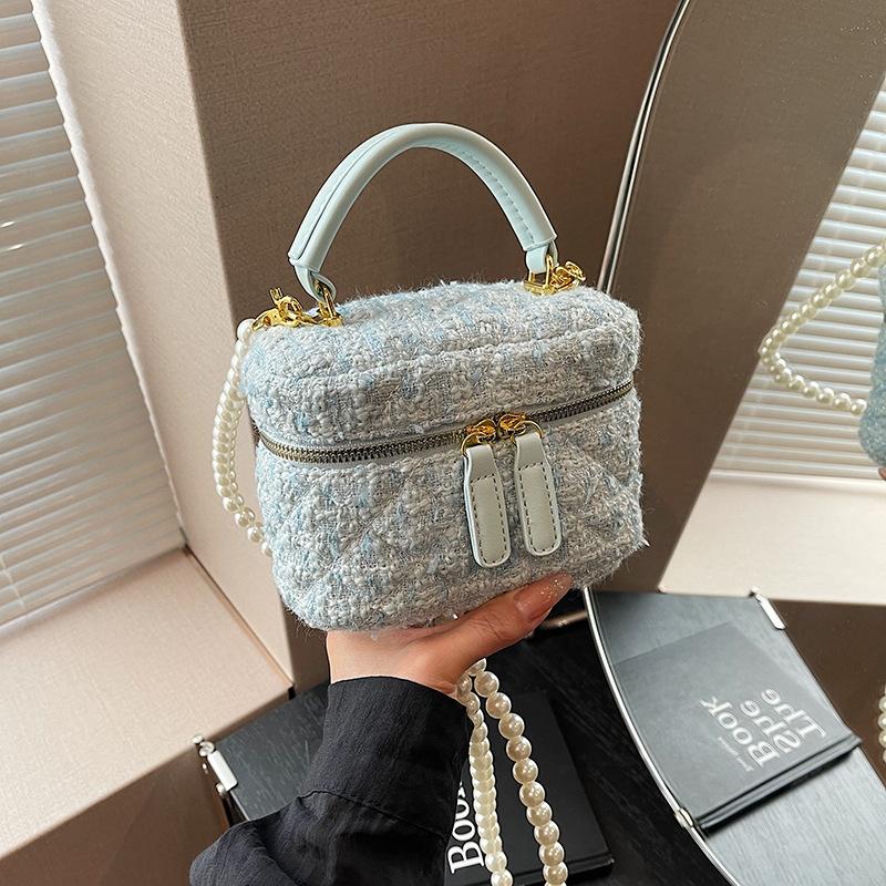 

Hand carry fashionable Xiaoxiangfeng bucket bag 2024 autumn and winter new simple and versatile shoulder bag crossbody women s bag tide світло-синій колір