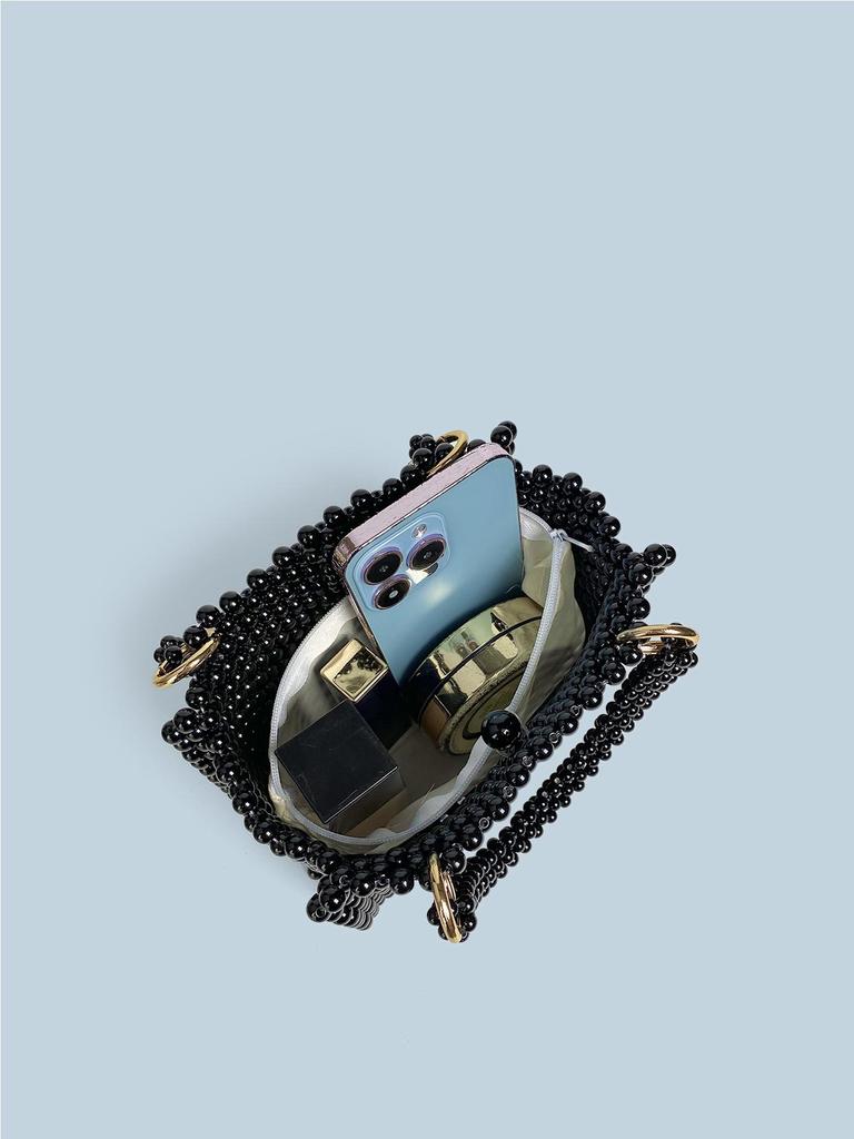 Damska torebka na ramię z czarnych pereł