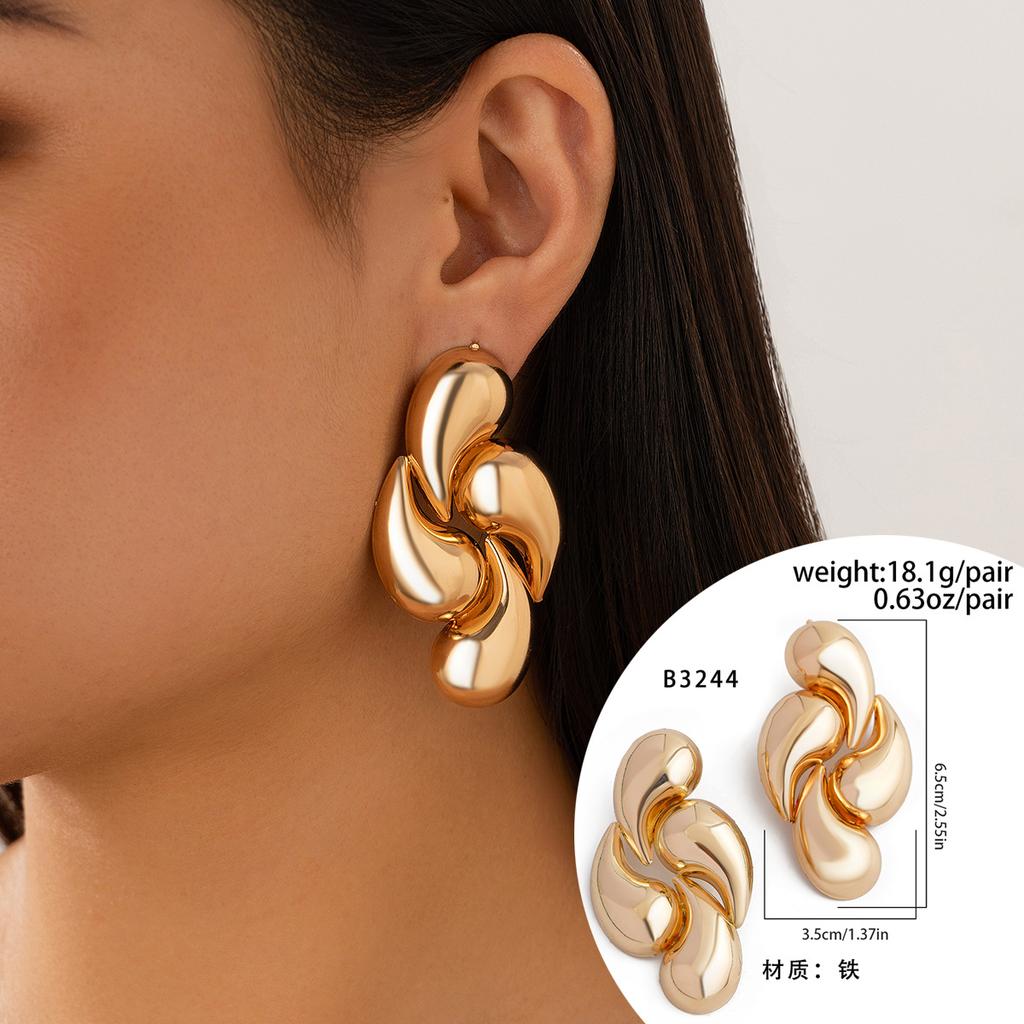 Street shots ins geometric metal earrings earrings design glossy surface comma water drop stud earrings female