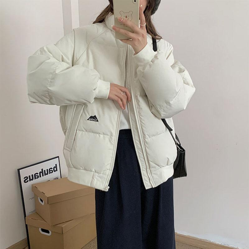 

Stand-up collar white duck down jacket women s 2025 winter small fashion thickened student straight version jacket tide M білий