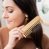 A Bamboo and Wood Hair Comb for Both Men and Women, Featuring A Wide-Toothed Design for Curling Hair and Grooming Beards