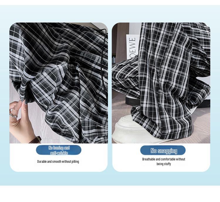 Dámské kalhoty s vysokým pasem, černo-bílé kostkované, se širokými nohavicemi a splývavým střihem