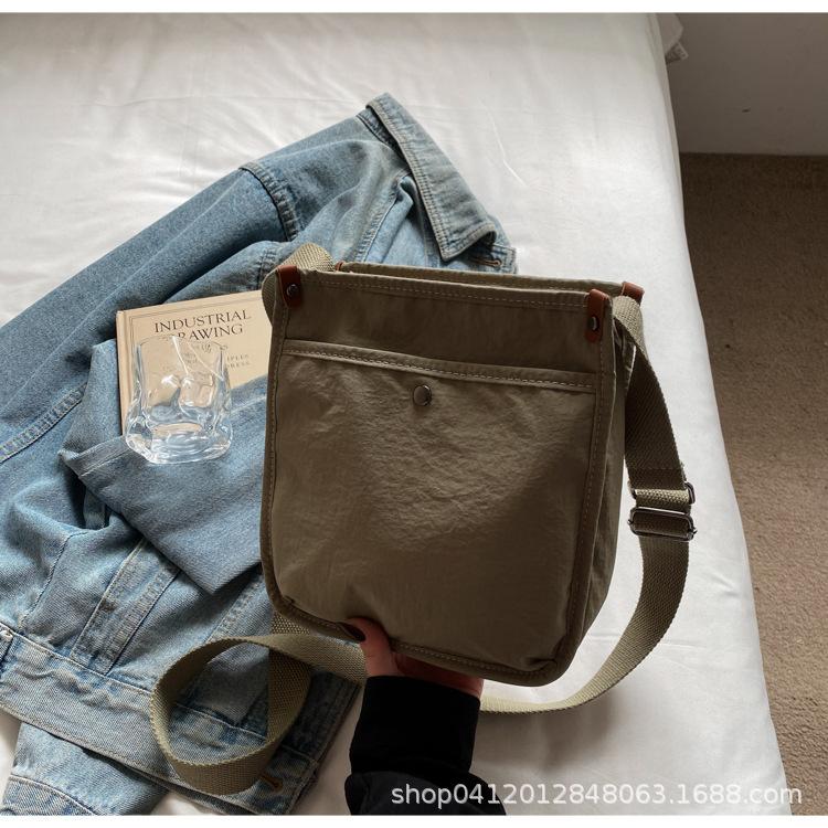 Korean version of casual canvas bag new solid color simple fashion trend shoulder bag niche design messenger bag mobile phone bag