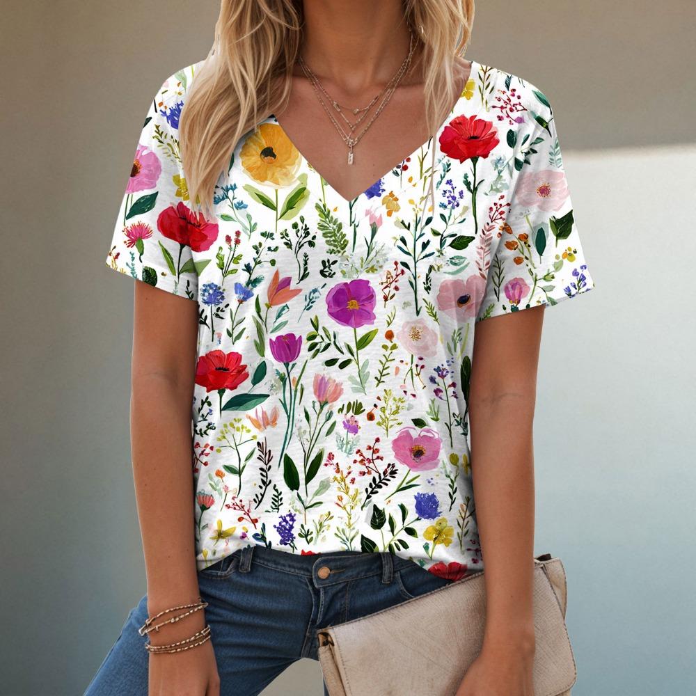 T-shirt estiva casual e alla moda con scollo a V, maniche corte e fantasia per donna. Stile ampio e casual, adatto da indossare per le signore.