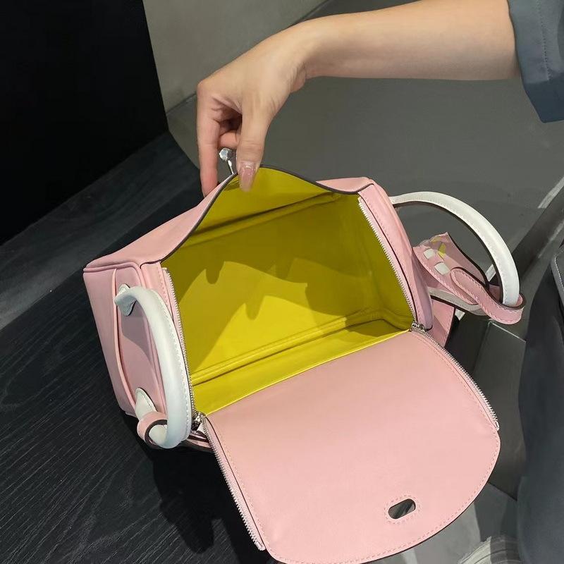 25 New Genuine Leather Women's Bag Swift Head Layer Cowhide Color Blocked Weaving Medicine Box Lindi Bag Single Shoulder Handheld Cross Border Batch