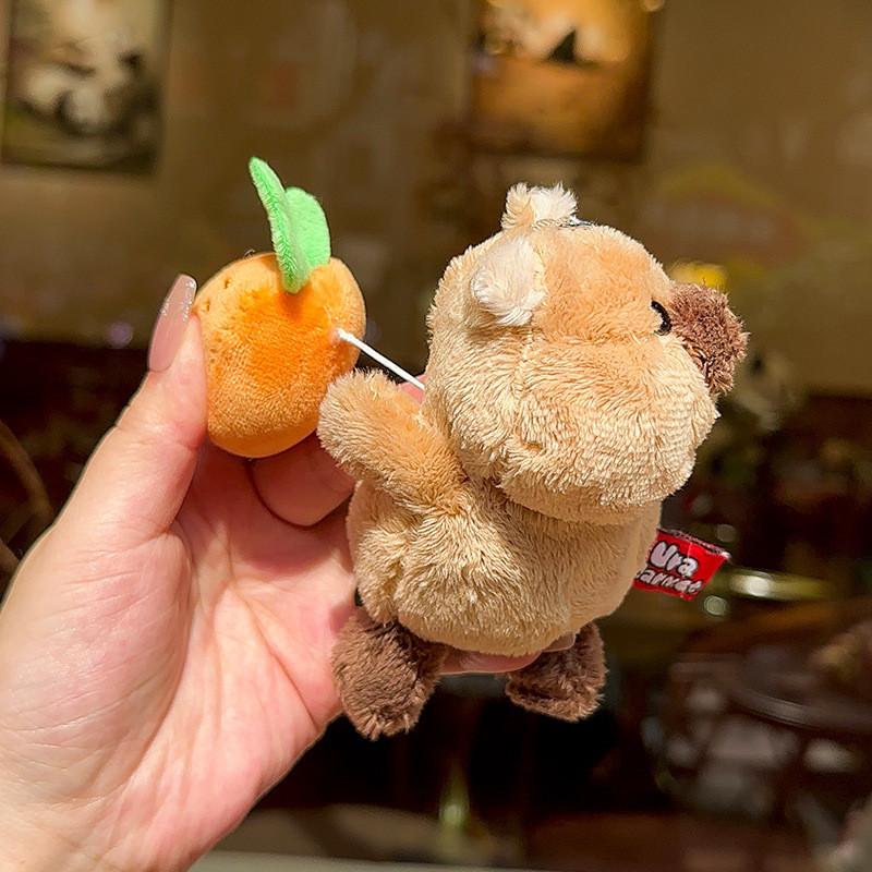 

Ground Ural Dried Squirrel Plush Keyring With Pulling Carrot Toy For Gift Light Brown Back