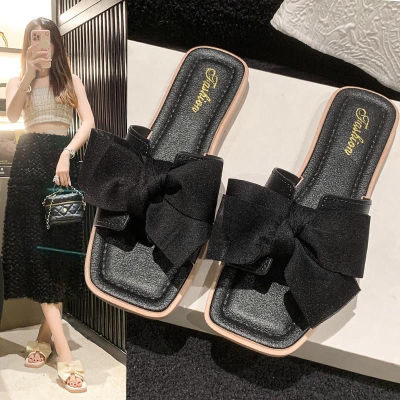 Bow slippers women's summer wear new fashion home flat bottom non-slip fairy wind one-word sandals soft bottom