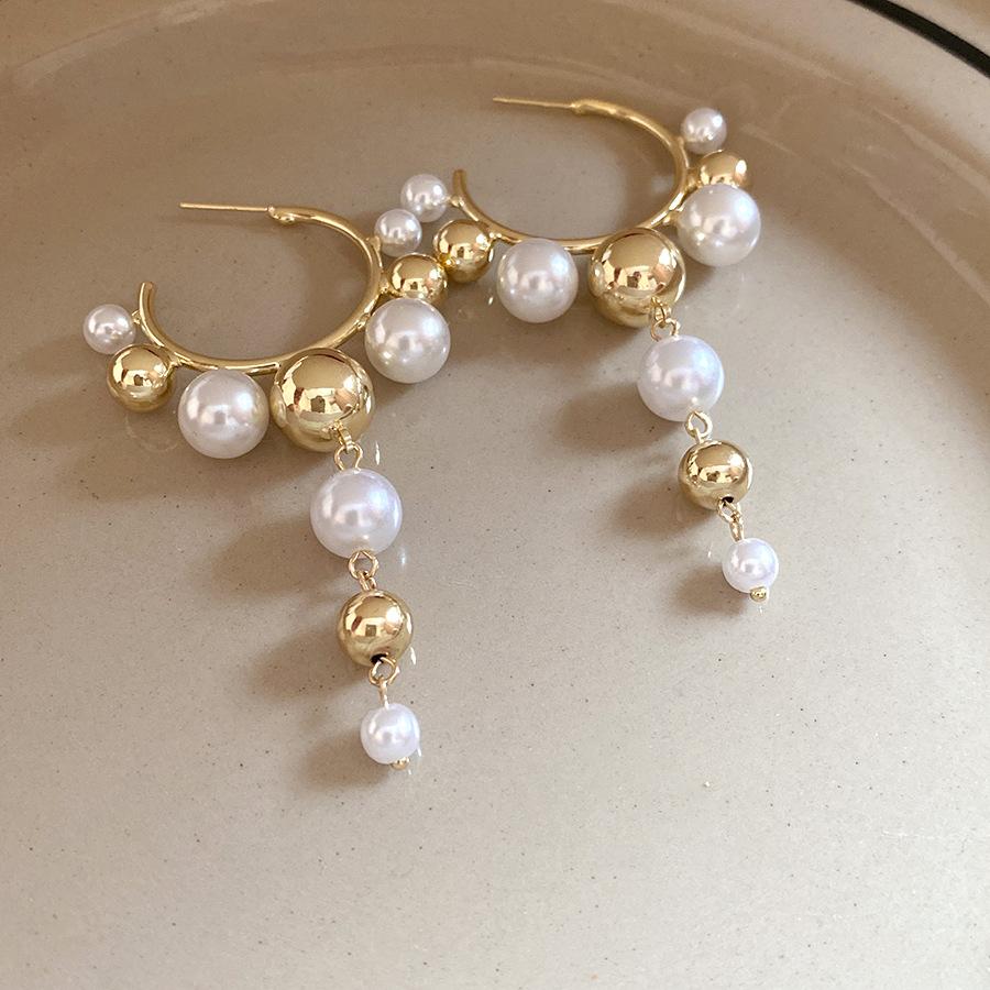 

Silver needle pearl C-shaped fringed earrings new light luxury fashion temperament earrings niche high-end earrings women