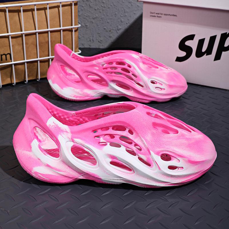 Große Größe Camouflage Kokosnussloch Schuhe Herren Sommer 2025 Neu Hohl Tasche Kopf Graffiti Sandalen Rutschfest Strand