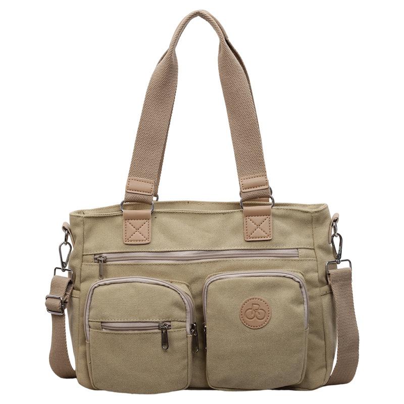Stylish Canvas Shoulder Bag for Women, Multi-Pocket Tote with Adjustable Strap and Durable Design