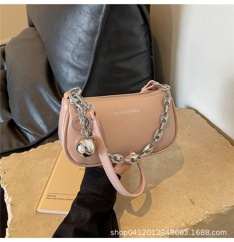 

2025 new fashionable silver armpit bag Korean version ins work commuter mobile phone bag niche design shoulder women s bag рожевий