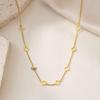 European & American Titanium Steel Hollow Four-Leaf Clover Necklace - Light Luxury, Colorfast, Versatile Thin Chain for Women