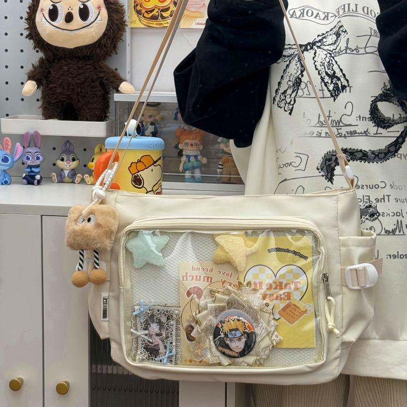 2025 College Style Dámská messenger taška s velkou kapacitou - Průhledný odznak s knoflíkem Ita Bag