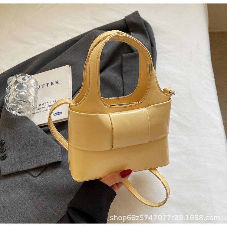 

Niche design handbag 2025 new pink sweet bow bag women s premium texture shoulder messenger bag жёлтый