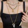 2026 European Retro Stackable Multi-Layer Pearl Necklace: Personalized Sweater Chain for Women