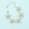 Retro Geometric Metal Flower Bracelet for Women - High-End Woven Jewelry