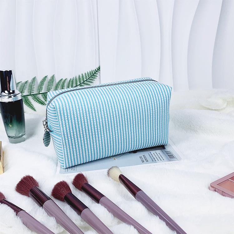 Seersucker Makeup & Toiletry Bag: Large Capacity, Embroidered, Striped Travel Clutch
