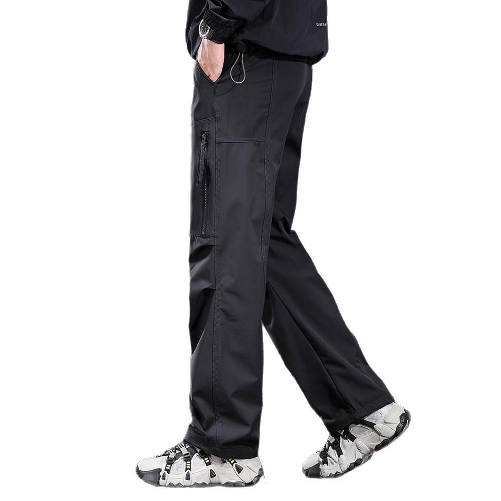 High-end outdoor charging casual pants men's loose straight paratrooper pants three-proof hiking sports mountain tooling trousers tide