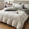 Luxury Three-Layer Gauze Pure Cotton Jacquard Bedding Set - Includes Duvet Cover, Fitted Sheet, and Bed Sheet.
