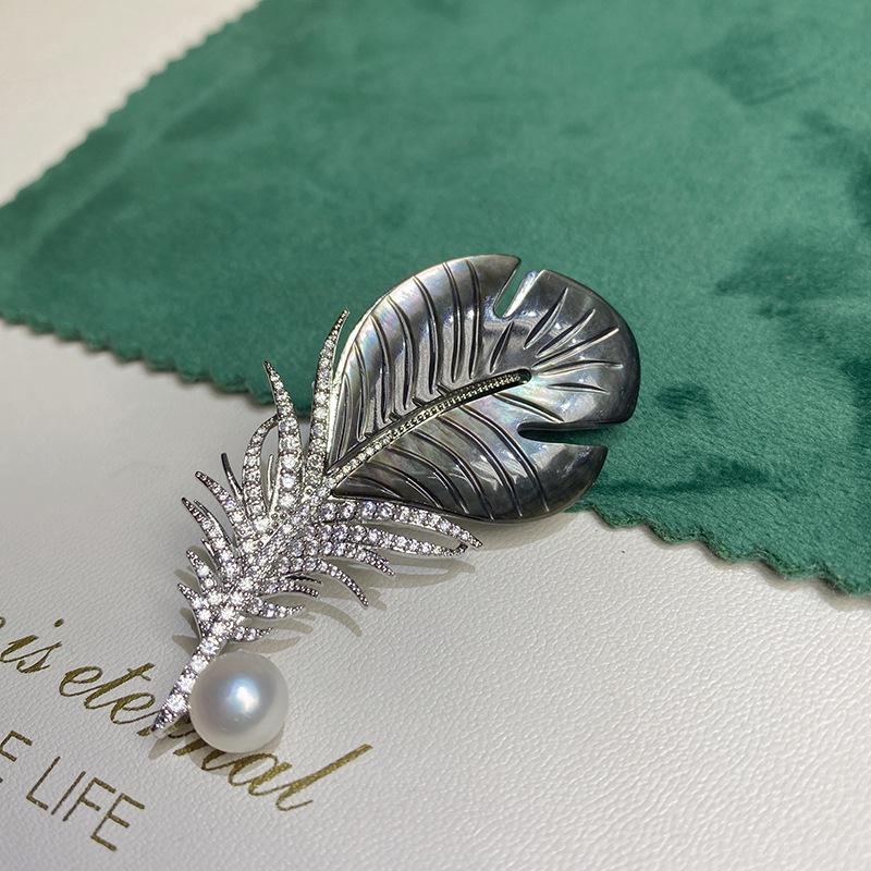 Gold-Plated Zircon Shell Feather Brooch with Pearl Accent