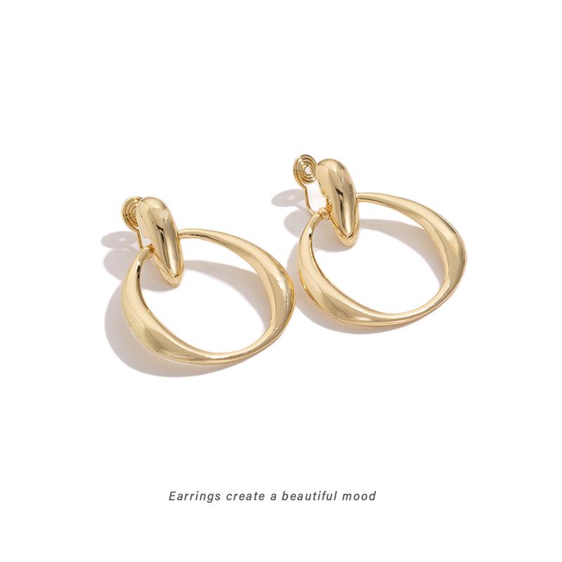 Elegant Retro Silver Hoop Earrings - Circular Geometric Design with High-End Luxury Mosquito Coil Inspired Ear Clips
