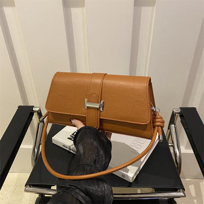 

Продвинутый сенс 2025 новая сумка-багет с каменным узором, сумка под мышкой, осенне-зимняя, нишевый дизайн, женская легкая роскошь коричневый