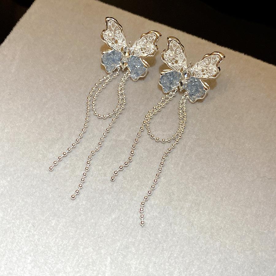 

Silver needle pearl flower fringed earrings female giant good-looking unique and beautiful temperament stud earrings new versatile earrings