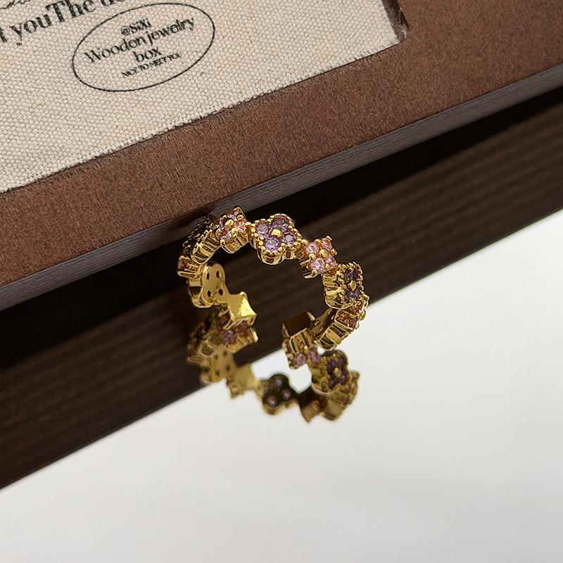 Retro Light Luxury Goldkette Hohl Vierblättriges Kleeblatt Diamantbesetzt Zirkon Kupfer Münze Gürtelschnalle Öffnungsring Nische Stapelring