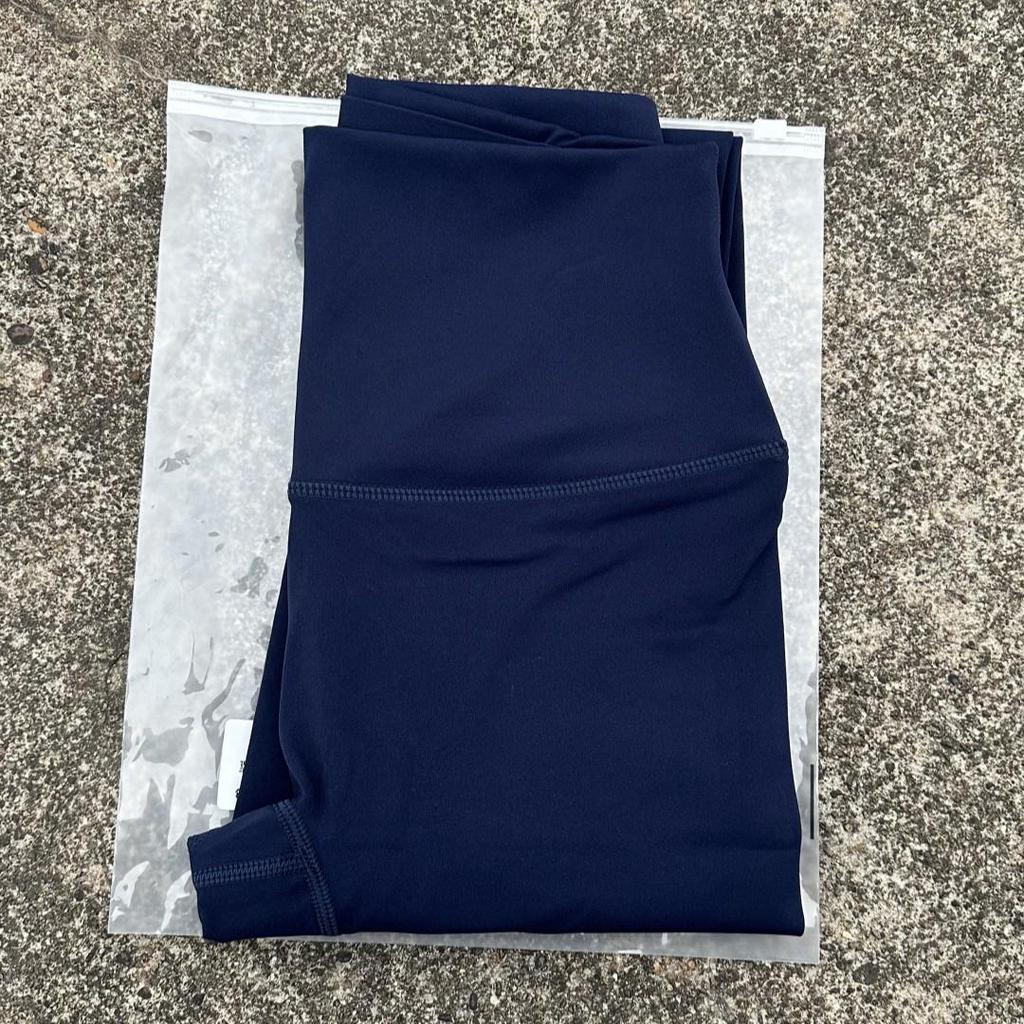 Solid Color High-Waisted Women's Yoga Leggings with Back Pocket – Soft, Elastic, and Peach Bum Enhancing