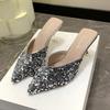 Silver bag head half slippers women's summer wear 2025 niche stiletto pointed sequined back empty high heels with skirt