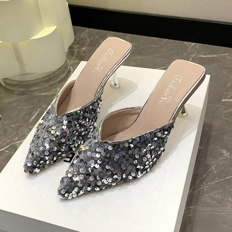 Silver bag head half slippers women's summer wear 2025 niche stiletto pointed sequined back empty high heels with skirt