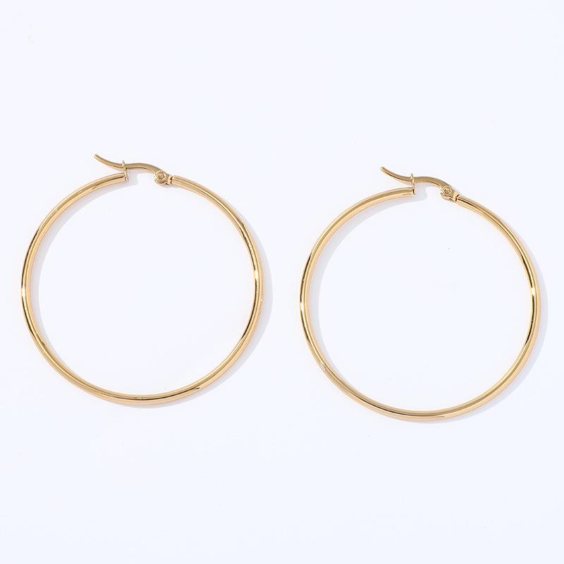 Pendientes de aro geométricos de acero inoxidable dorado con estrella de cinco puntas