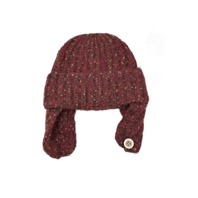 New snowflake point flanged wool hat women's autumn and winter warm knitted hat vertical strip bag head cold hat tide
