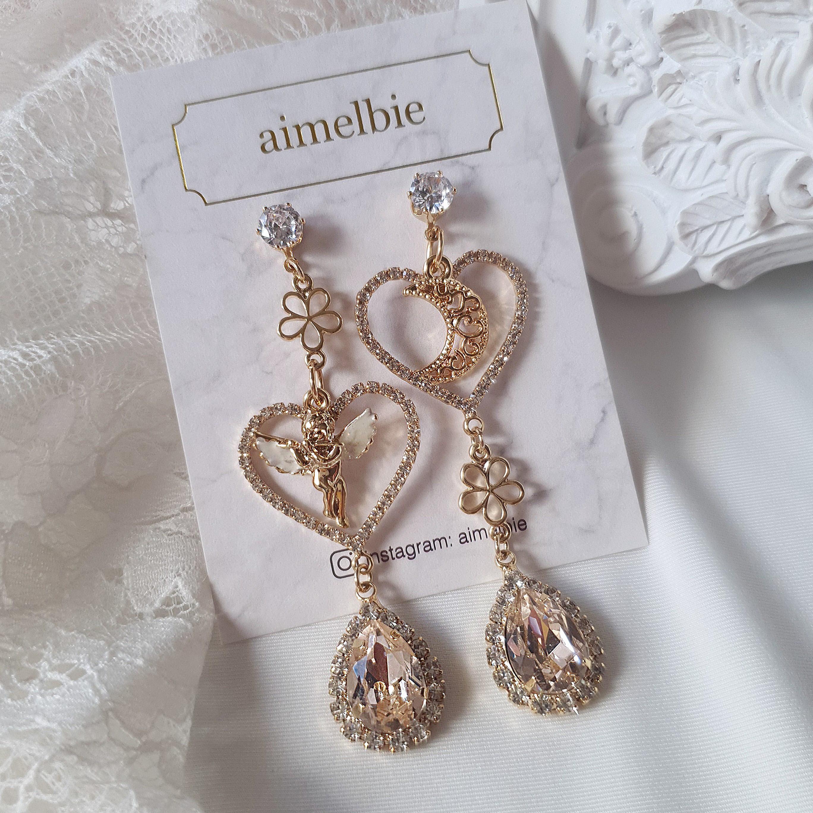 

Сережки «Місяць і янголятко» - рожевий шампань