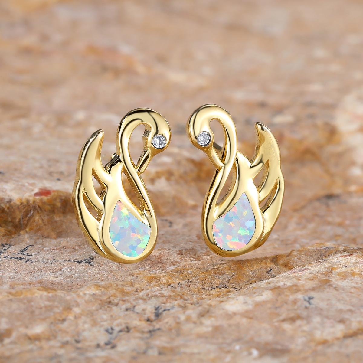 Модные серьги-лебеди с кристаллами циркона — фото 9