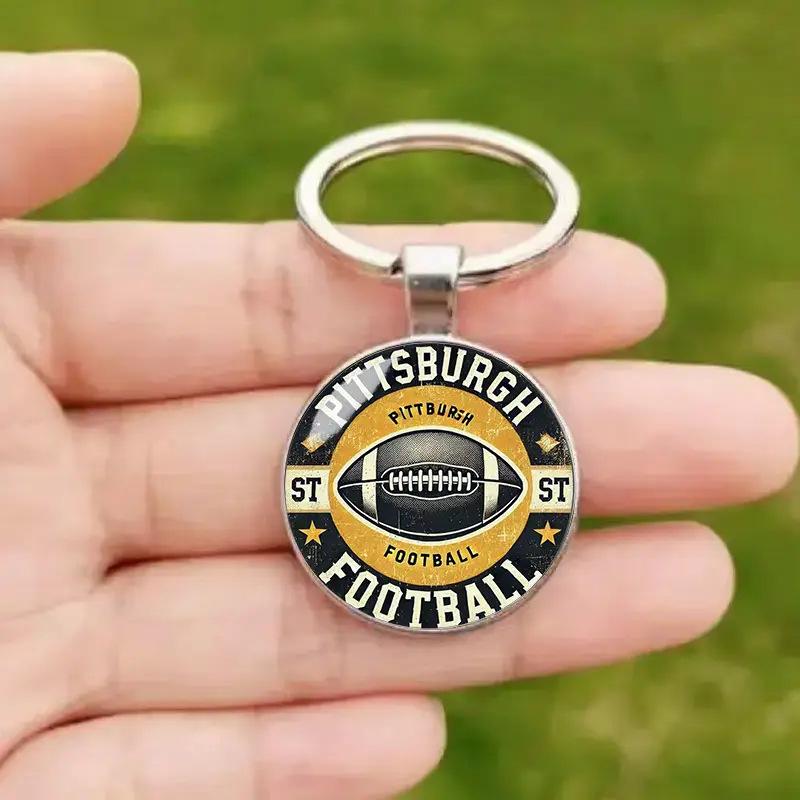 Fupitsburg Black Gold Retro Sports Design Alloy Glass Pendant Keychain