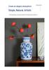 Blue & White Hand-Painted Porcelain Vase: Elegant Ceramic Ornament for Living Room or Entryway.