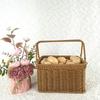 Handhållen picknick- och förvaringskorg i rottingstil