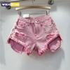 2026 Summer New Women's Pink Hole Denim Shorts High Waist Slimming Spicy Girl A-line Ragged Edge Shorts