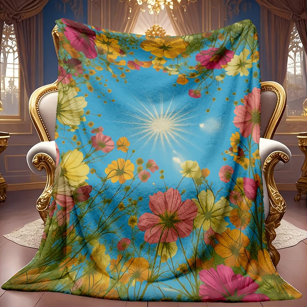 Cozy Fleece Blanket Featuring a Vibrant Floral Design with a High-Definition Digital Print of Colorful Flowers Against a Blue Sky. Ideal for All Seaso