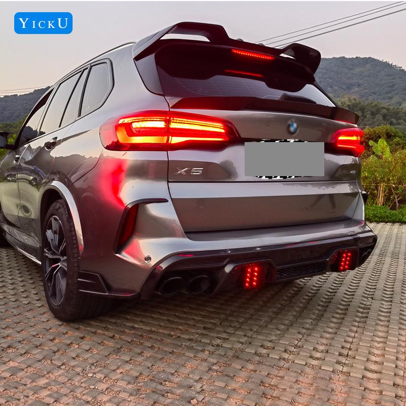 BMW X5M F95 Carbon Fiber Body Kit: Front Lip Splitter, Rear Lip, Side Skirts, Wind Deflectors, Tail Wing with Lights.