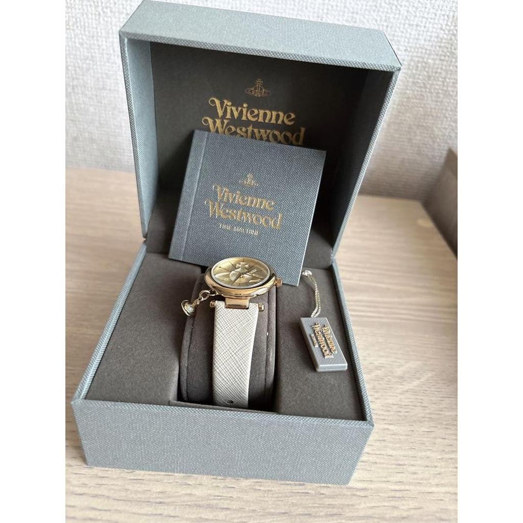 Used Vivienne Westwood white wristwatch with chaRM, in box, working condition