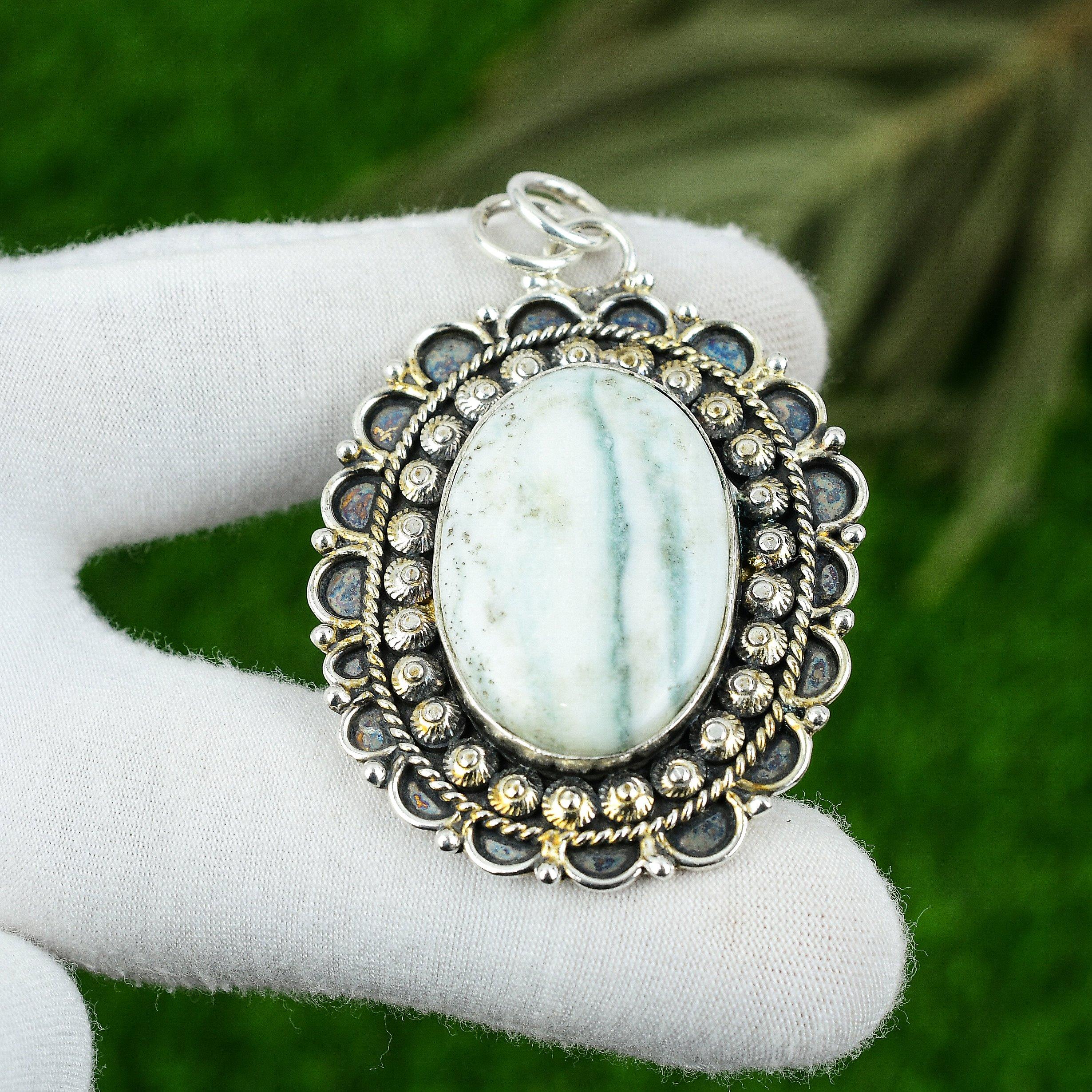 

Серебро 925 пробы Овальный камень голубого родохрозита Сестра Чакра сердца Новый кулон Ювелирное изделие