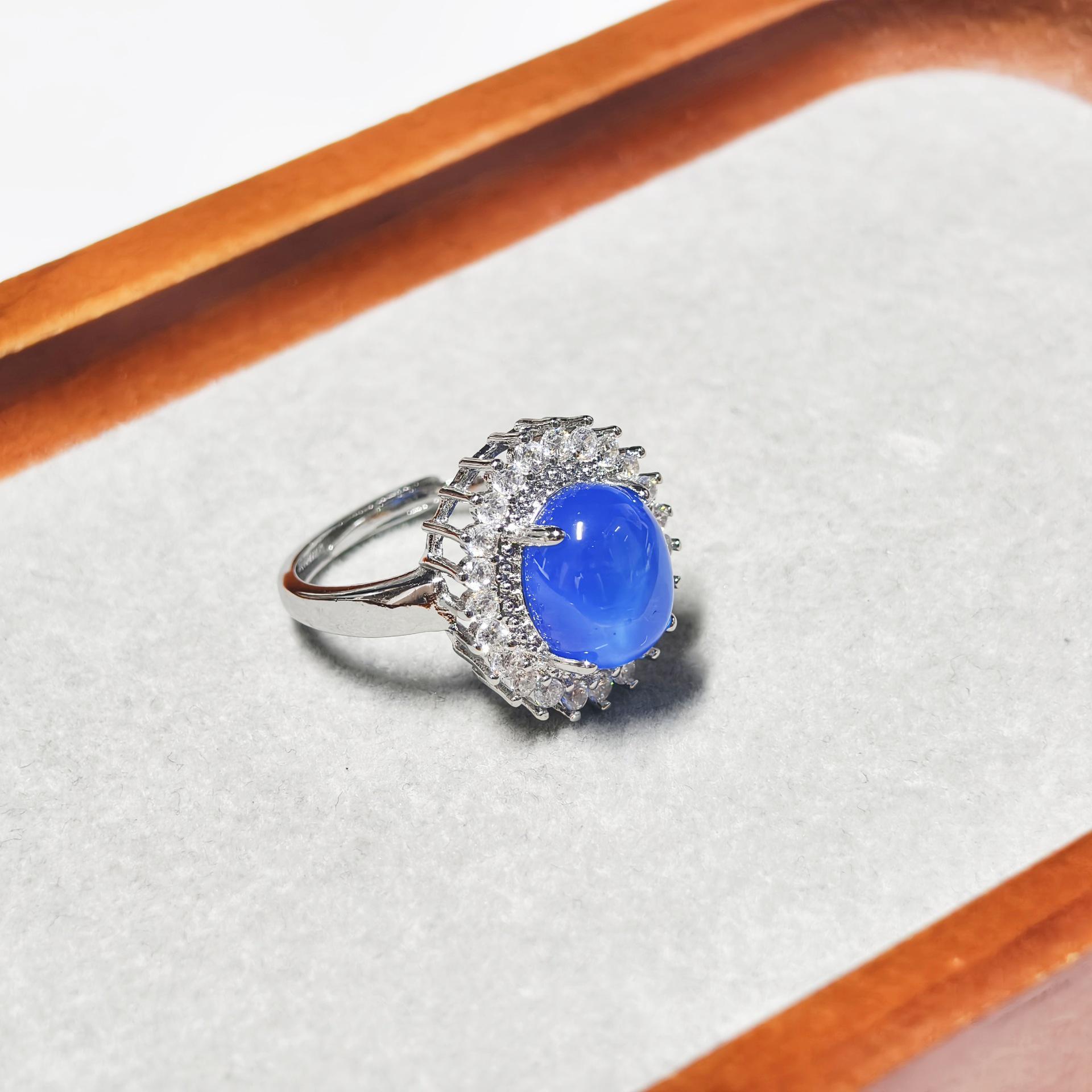 Gesen Blue Starlight Jewelry Set: Shimmering Stud Earrings, Ring, and Pendant Trio