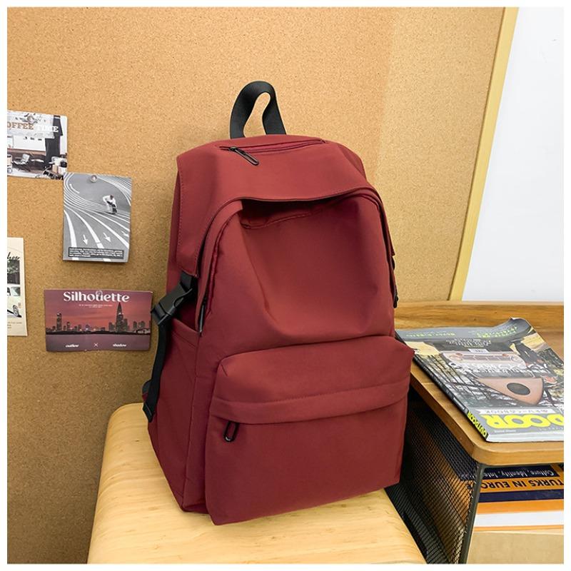 

Schoolbag Female College Students Ins Solid Color Light Large Capacity Backpack Simple Junior High School High School Korean Backpack Man