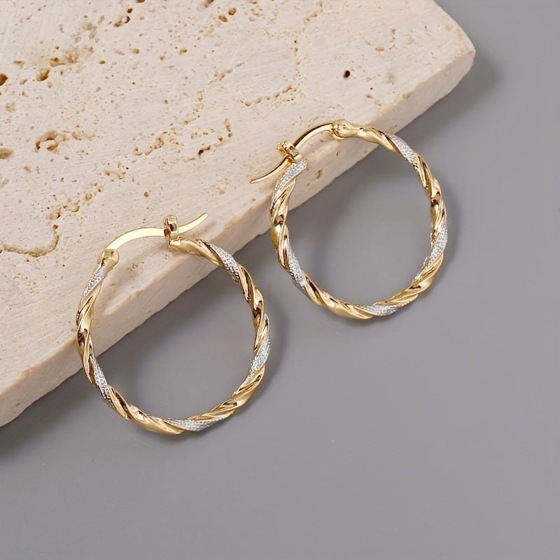 Electroplated earrings, European and American personalized large circle earrings, light luxury high-end earrings, women s copper earrings.