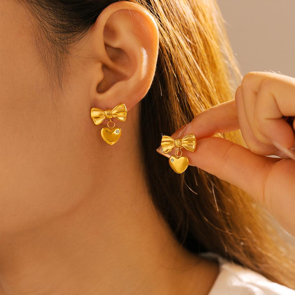 Gold-Plated Zircon Heart Stud Earrings with Pleated Bow Design